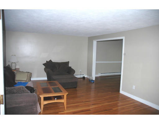 8 Watson Road Lexington, MA 02421 - Photo 3 of 11 a living room with furniture and wooden floor