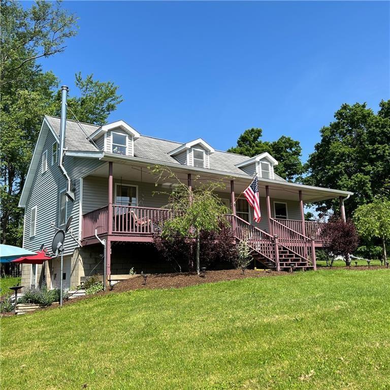 32753 Teepleville Road Centerville, PA 16404 - Photo 2 of 24 front view of a house with a yard