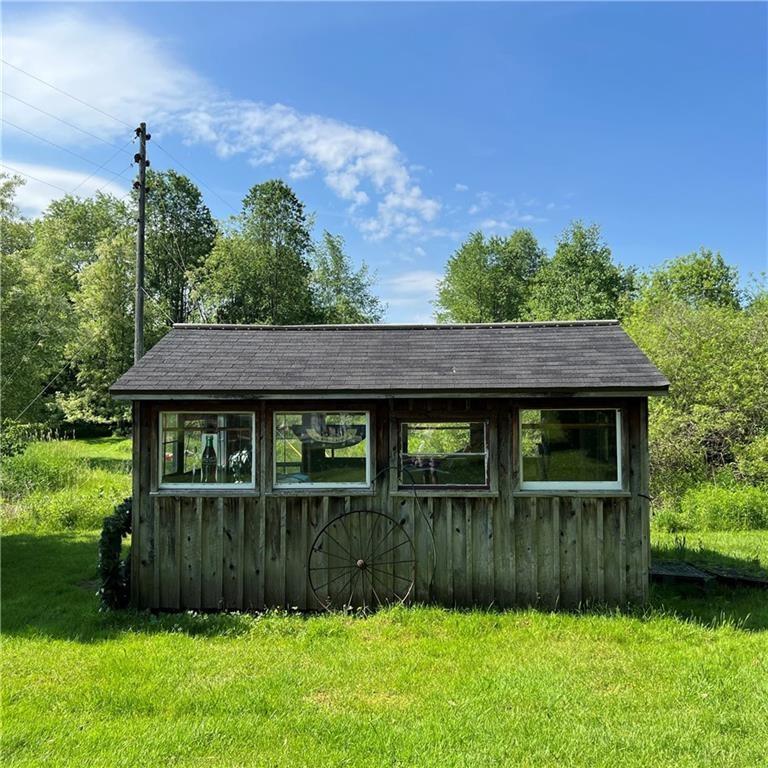 32753 Teepleville Road Centerville, PA 16404 - Photo 21 of 24 a view of a house with a yard