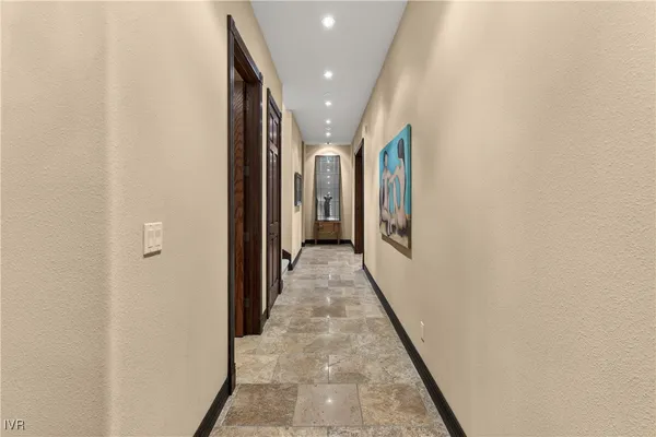 a living room with pool table and a table
