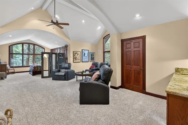 a view of a garage with cars