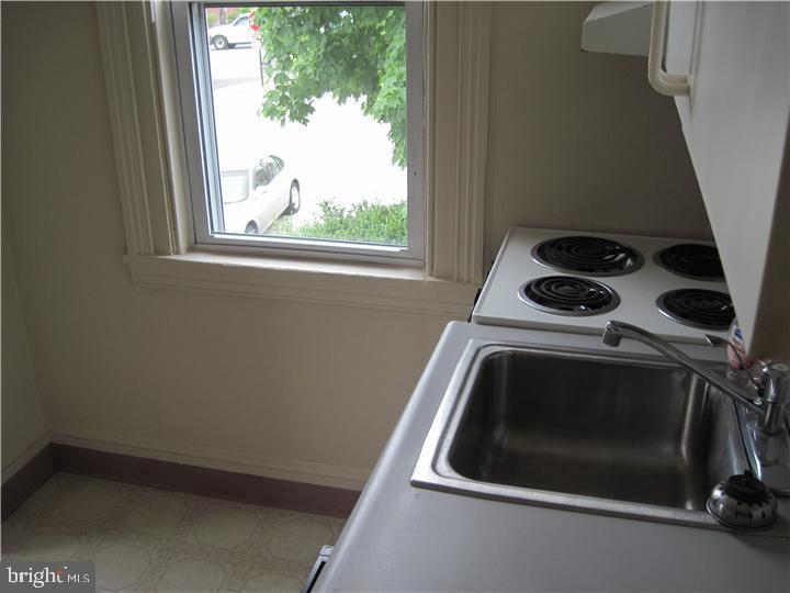 135 Sugartown Road, Unit 2B Wayne, PA 19087 - Photo 5 of 10 a utility room with dryer and washer