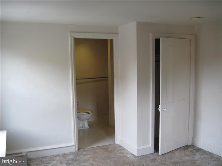 135 Sugartown Road, Unit 2B Wayne, PA 19087 - Photo 10 of 10 a bathroom with a toilet