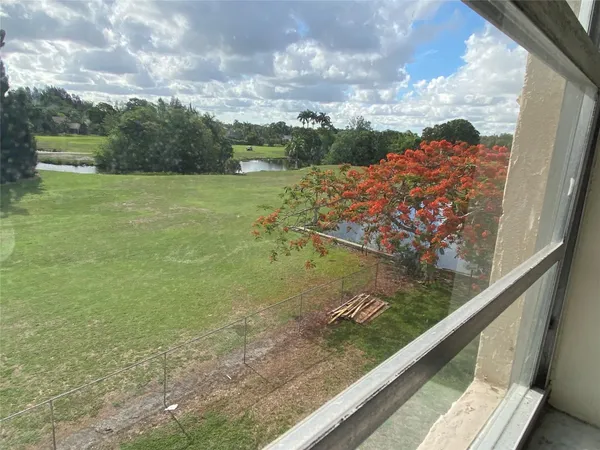 a view of a lake from a balcony
