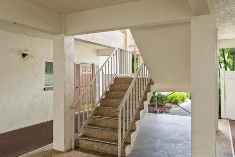 a view of a livingroom with furniture