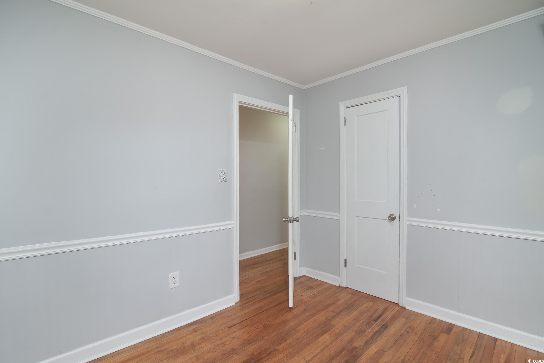 1916 Jasper Street Georgetown, SC 29440 - Photo 15 of 35 Unfurnished room featuring hardwood / wood-style f