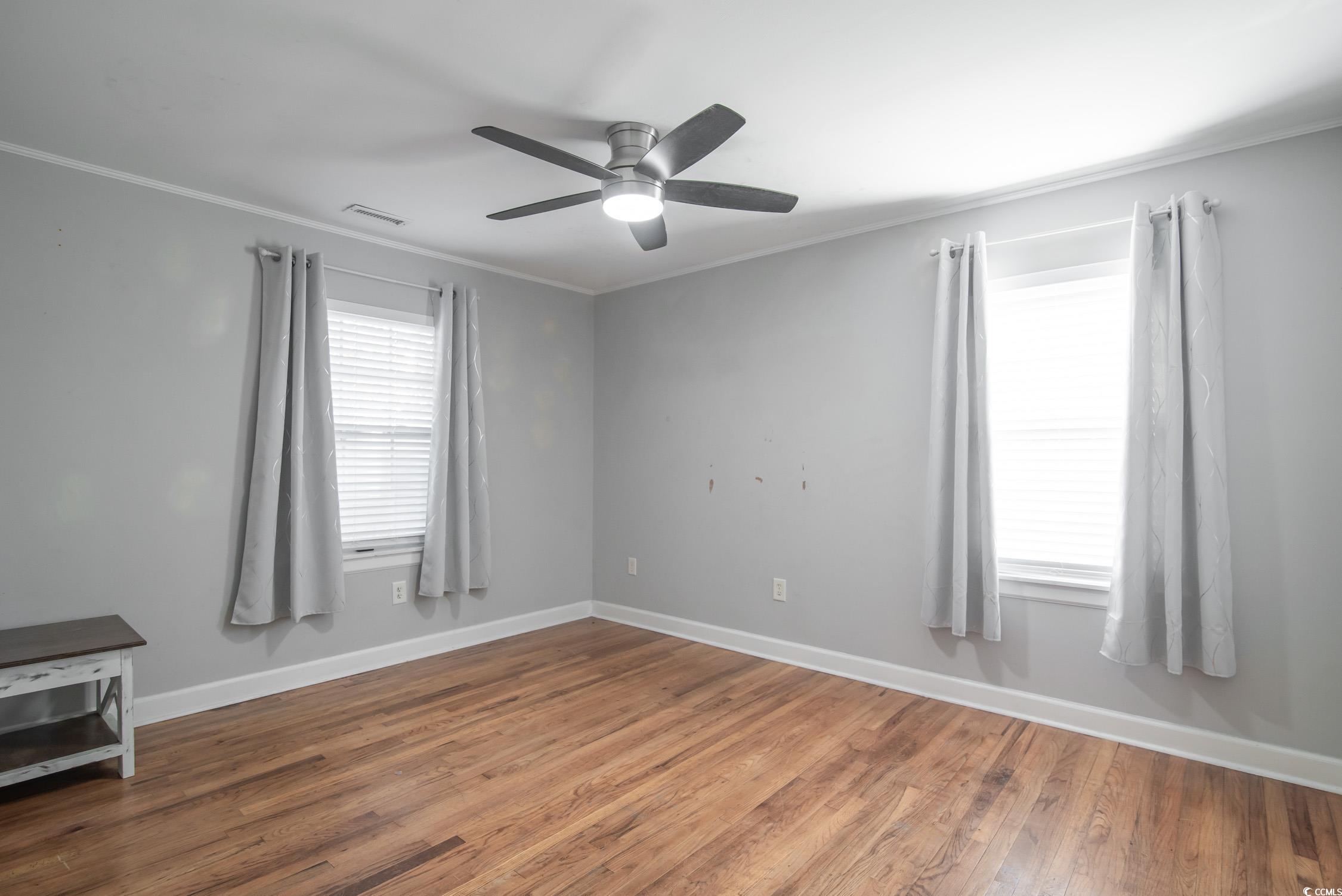 1916 Jasper Street Georgetown, SC 29440 - Photo 18 of 35 Empty room featuring hardwood / wood-style floors,