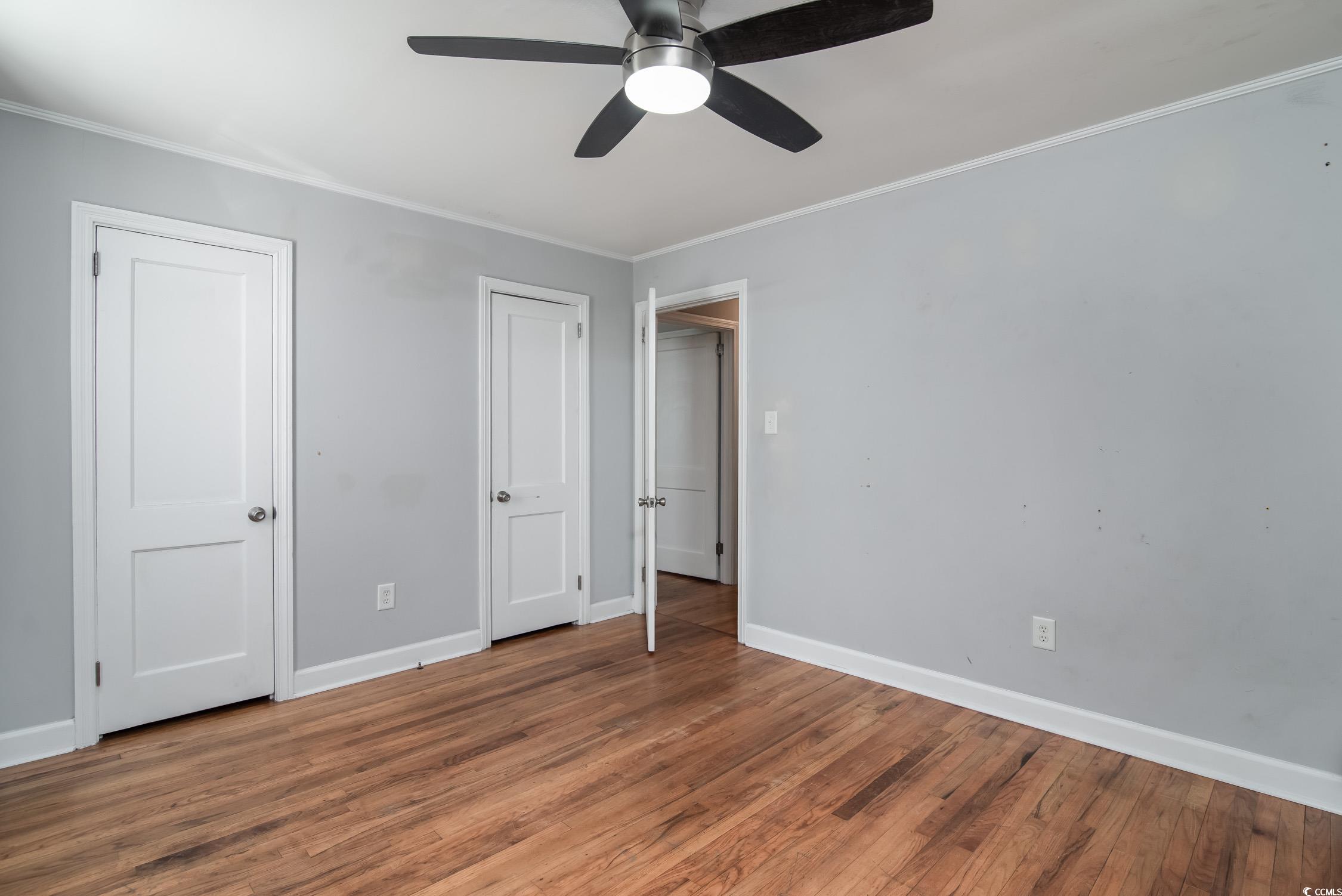 1916 Jasper Street Georgetown, SC 29440 - Photo 19 of 35 Unfurnished bedroom with hardwood / wood-style flo