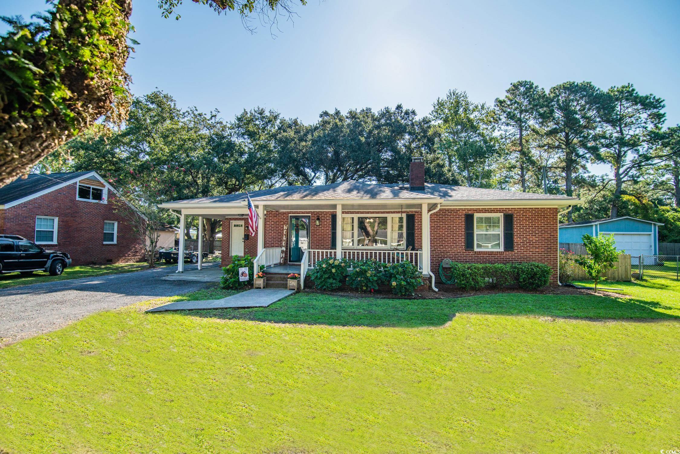 1916 Jasper Street Georgetown, SC 29440 - Photo 5 of 35 View of front facade with a garage, covered porch,