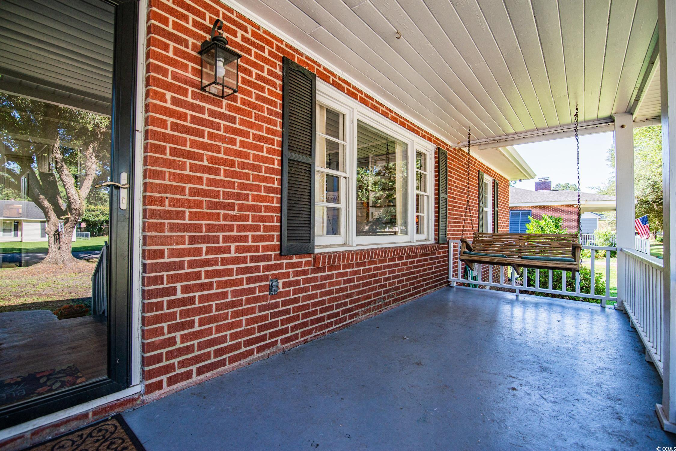 1916 Jasper Street Georgetown, SC 29440 - Photo 6 of 35 View of patio / terrace with covered porch