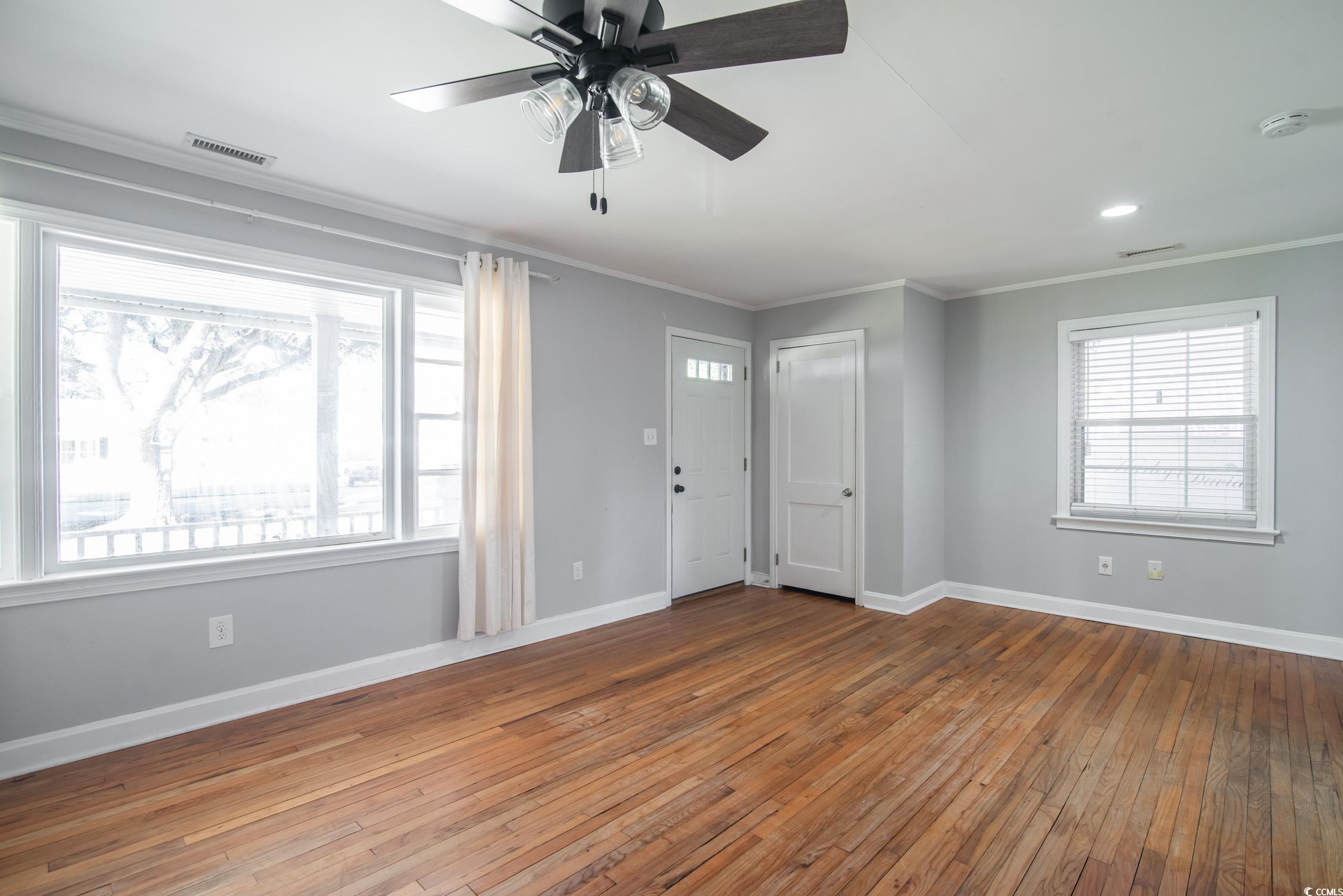 1916 Jasper Street Georgetown, SC 29440 - Photo 7 of 35 Entryway featuring ceiling fan, crown molding, and