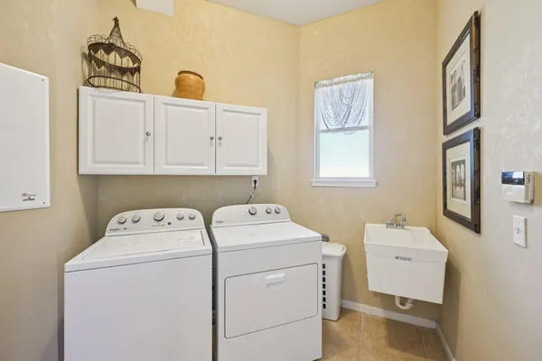 a room with table and chairs