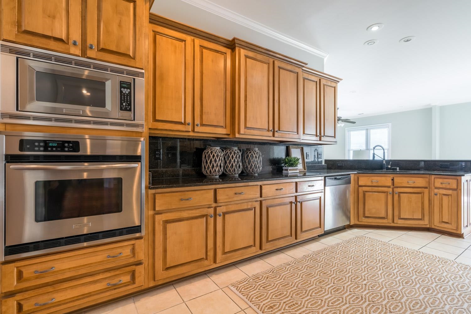 643 Hawks Peaks Road Collierville, TN 38017 - Photo 6 of 25 a kitchen with granite countertop cabinets stainless steel appliances and a sink