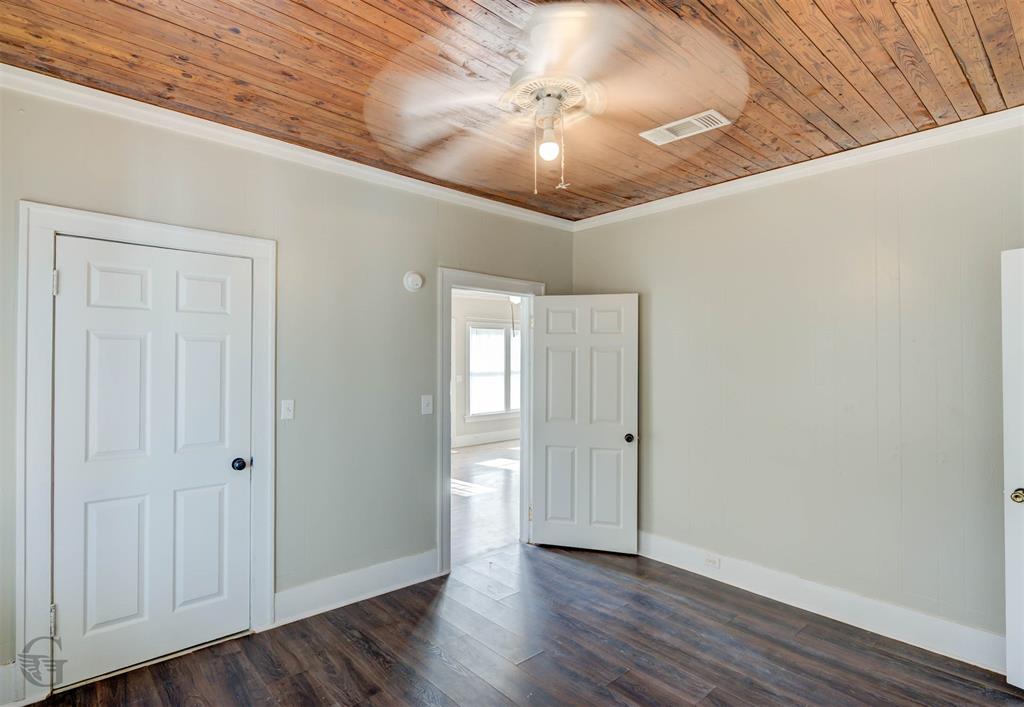 511 Chandler Street Minden, LA 71055 - Photo 13 of 16 a view of an empty room with wooden floor
