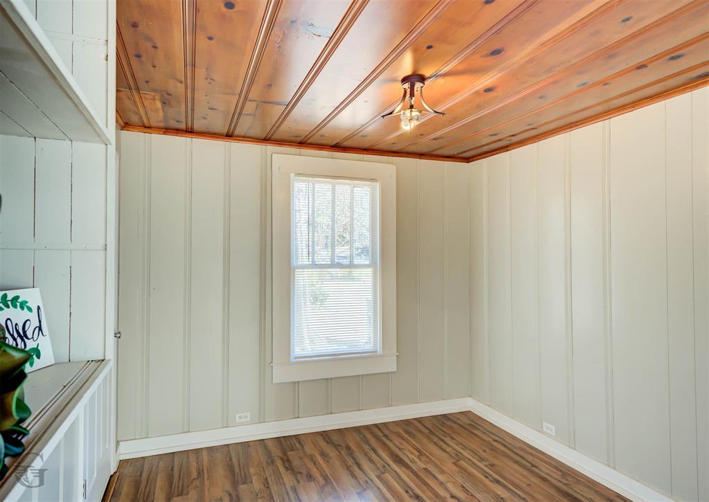 511 Chandler Street Minden, LA 71055 - Photo 9 of 16 a view of empty room with wooden floor and fan