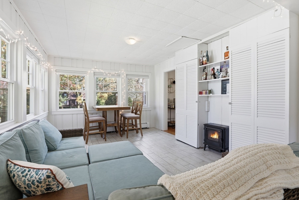 684 Haverhill Street Reading, MA 01867 - Photo 11 of 16 a living room with furniture and a fireplace