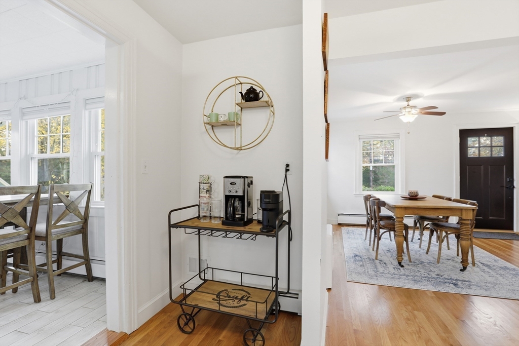 684 Haverhill Street Reading, MA 01867 - Photo 6 of 16 a view of a dining room with furniture window and wooden floor