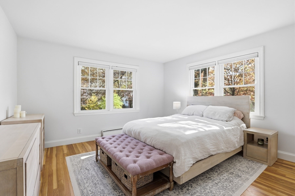 684 Haverhill Street Reading, MA 01867 - Photo 8 of 16 a bedroom with a bed and a window