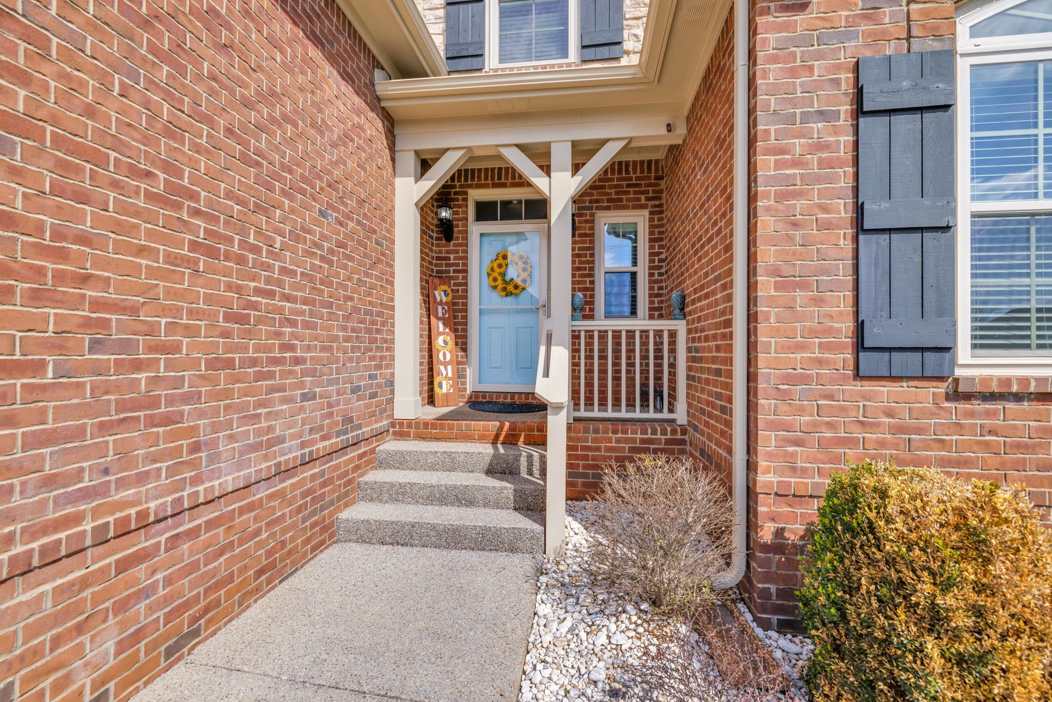 8023 Ragusa Circle Spring Hill, TN 37174 - Photo 2 of 46 a front view of a house with a porch