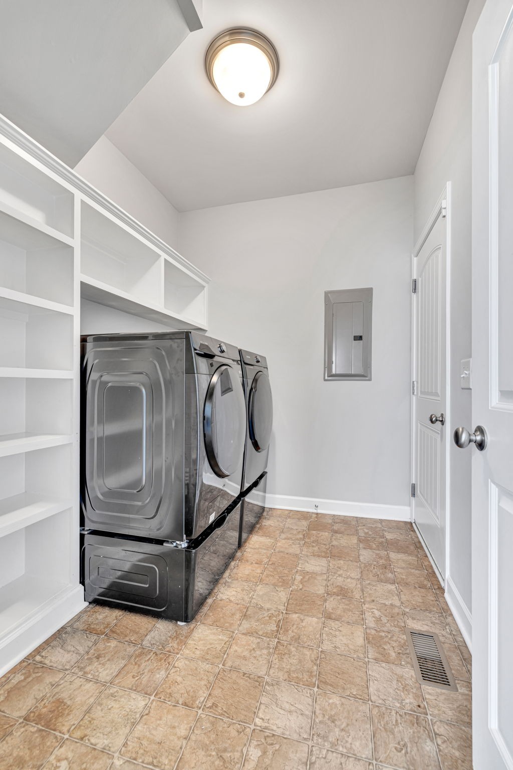 8023 Ragusa Circle Spring Hill, TN 37174 - Photo 24 of 46 a bedroom with a bed and a window