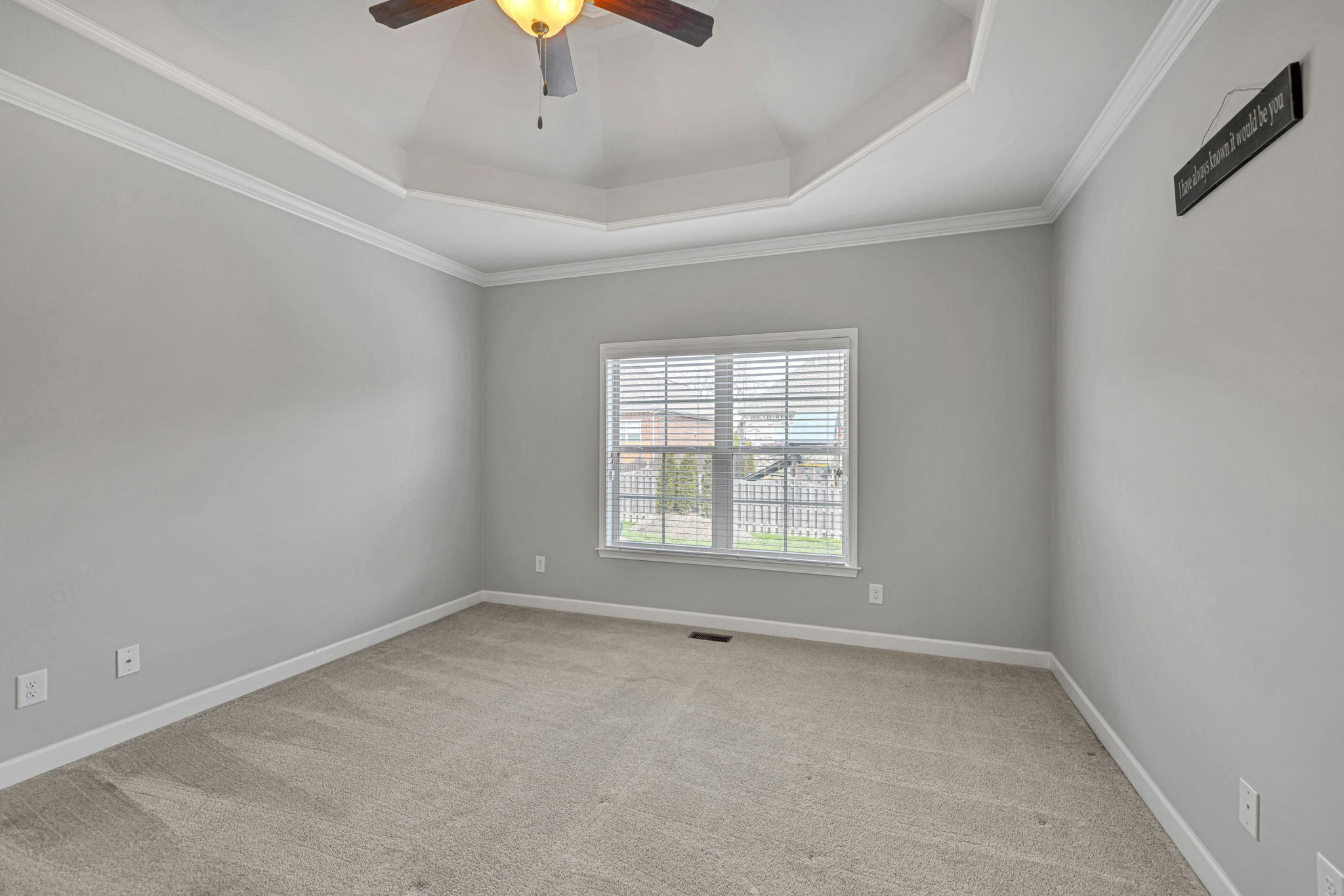 8023 Ragusa Circle Spring Hill, TN 37174 - Photo 26 of 46 an empty room with chandelier fan and windows