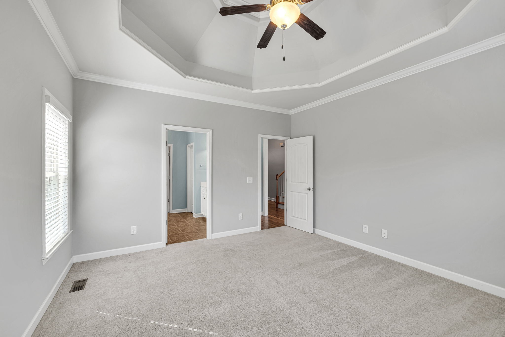 8023 Ragusa Circle Spring Hill, TN 37174 - Photo 27 of 46 a view of a livingroom with a ceiling fan and window