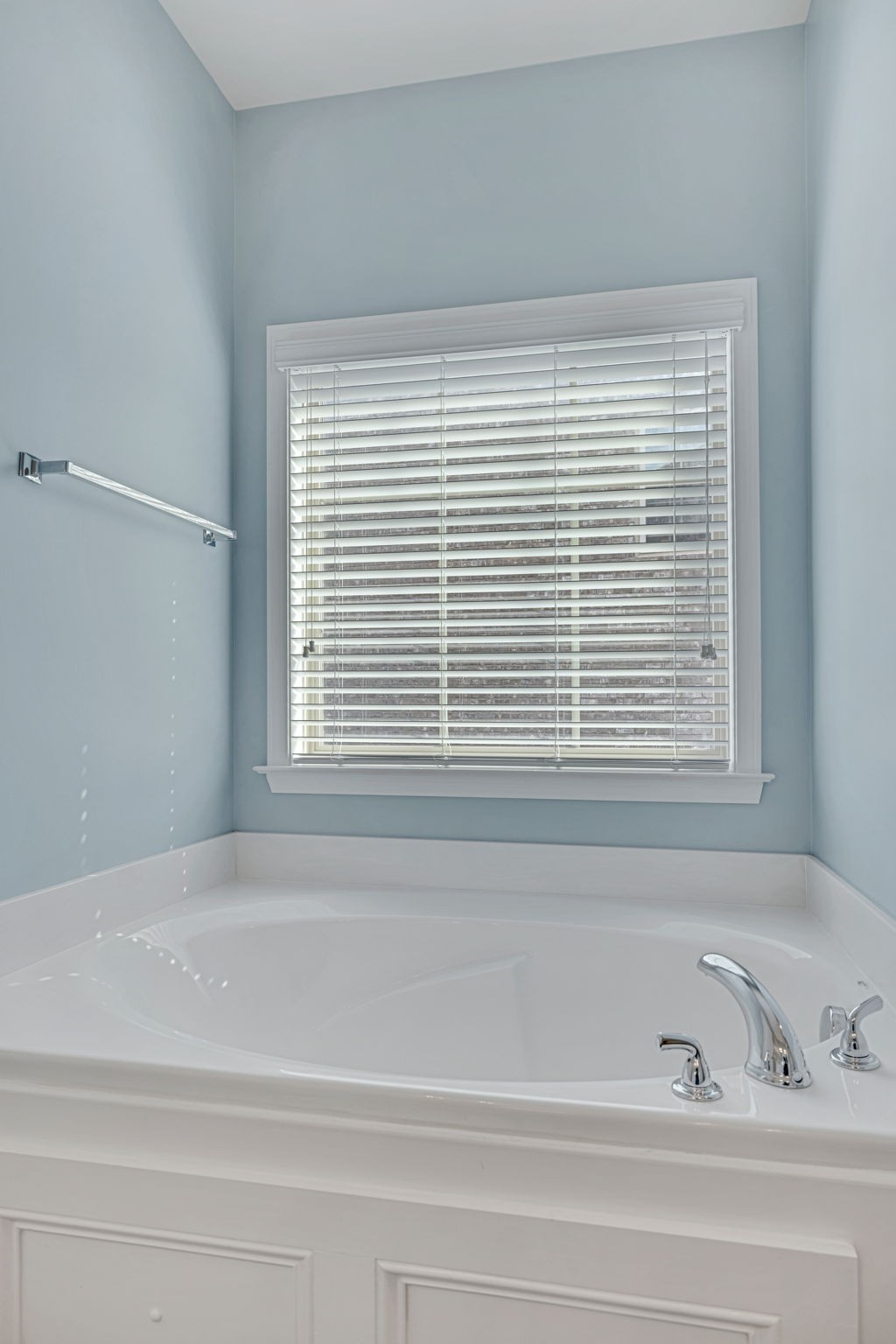8023 Ragusa Circle Spring Hill, TN 37174 - Photo 31 of 46 a bathroom with a bathtub and a window