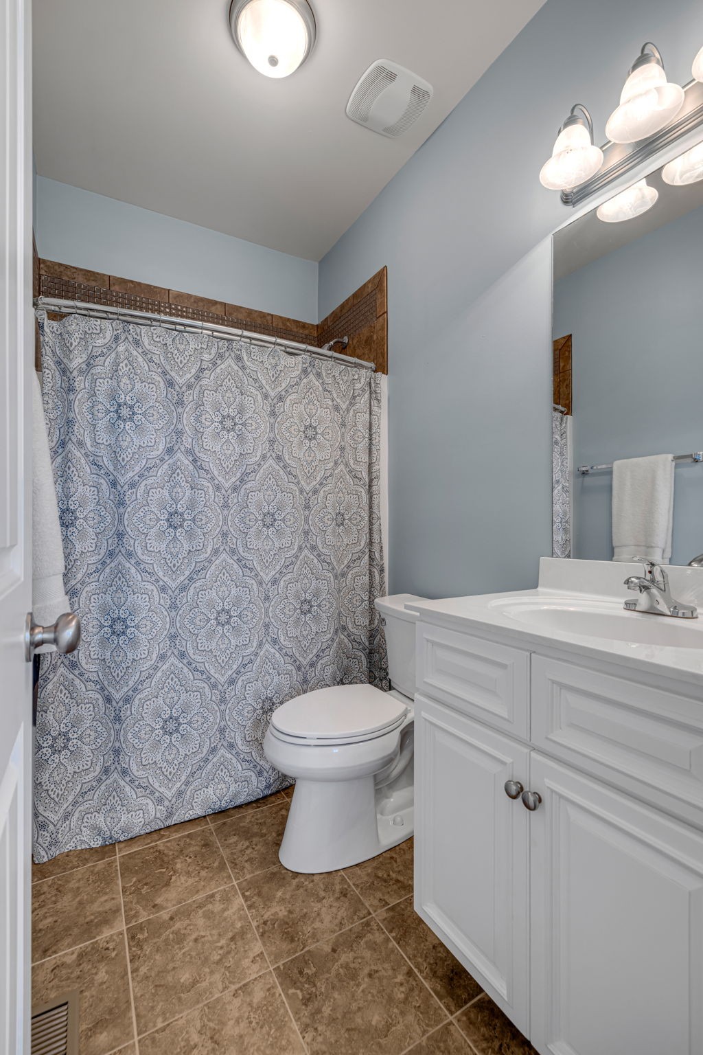 8023 Ragusa Circle Spring Hill, TN 37174 - Photo 35 of 46 a bathroom with a sink toilet and shower