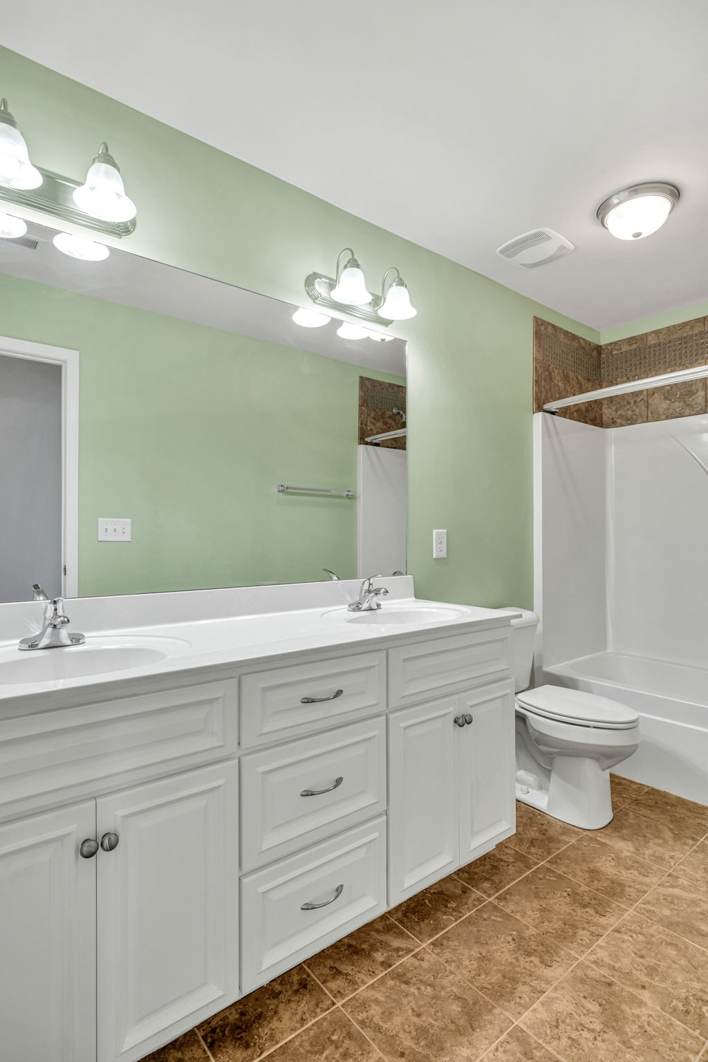 8023 Ragusa Circle Spring Hill, TN 37174 - Photo 37 of 46 a bathroom with a toilet sink and mirror