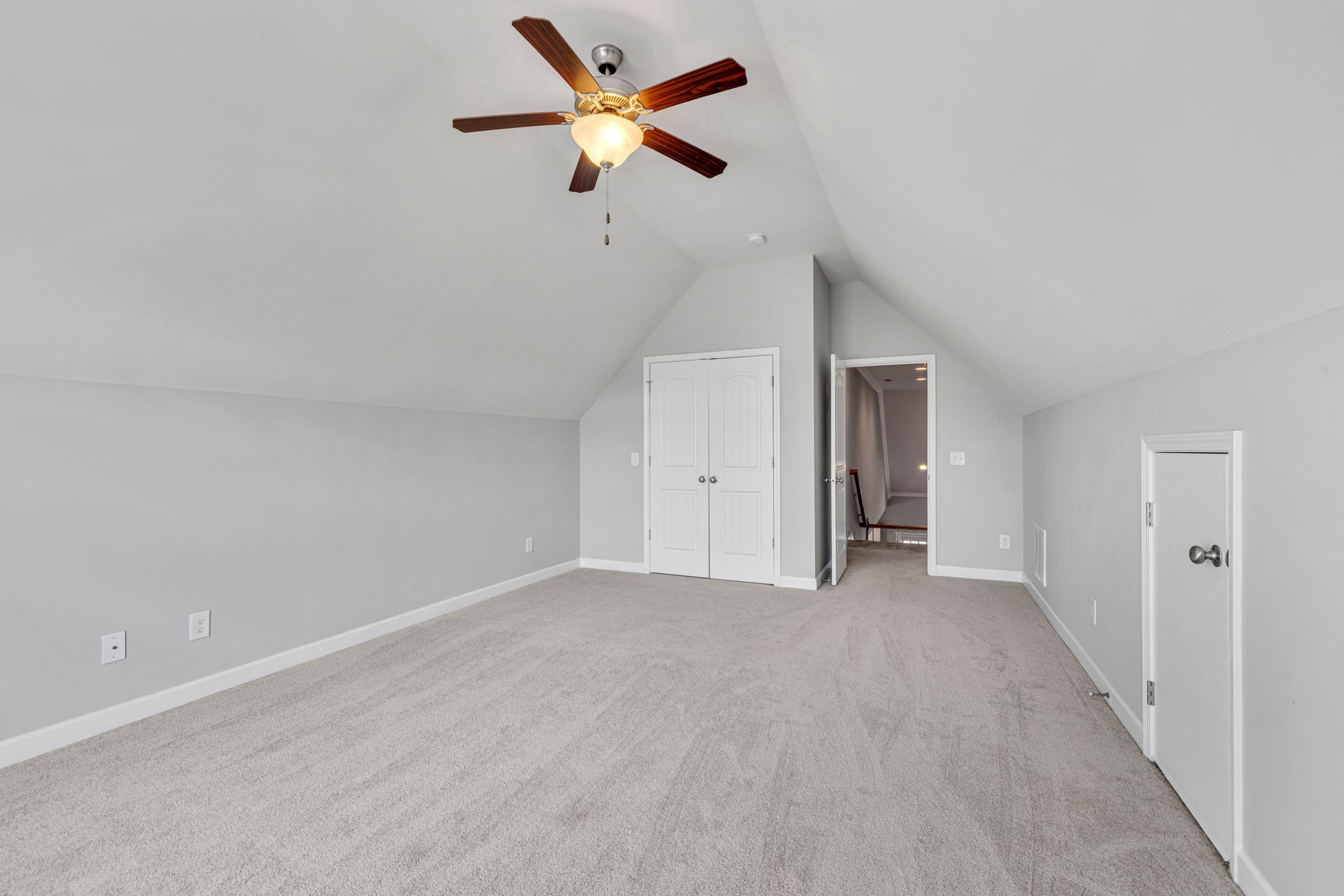 8023 Ragusa Circle Spring Hill, TN 37174 - Photo 41 of 46 an empty room with a ceiling fan and a window