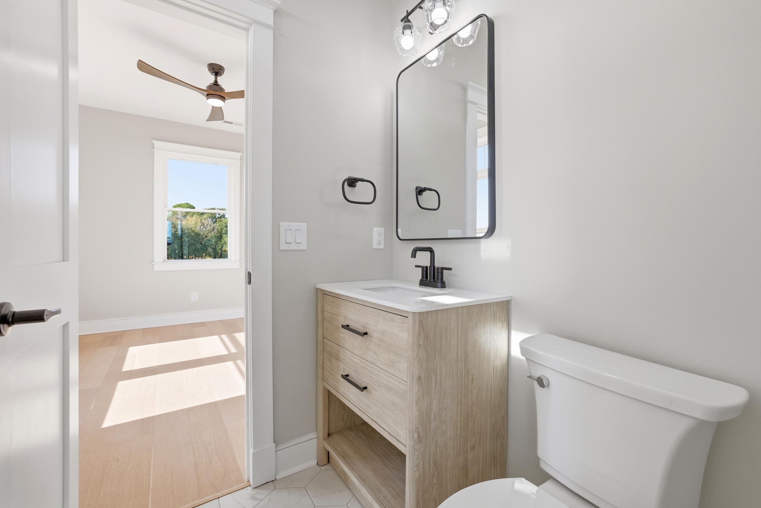145 Oak Bay Drive Georgetown, SC 29440 - Photo 25 of 39 Bathroom with vanity and a ceiling fan