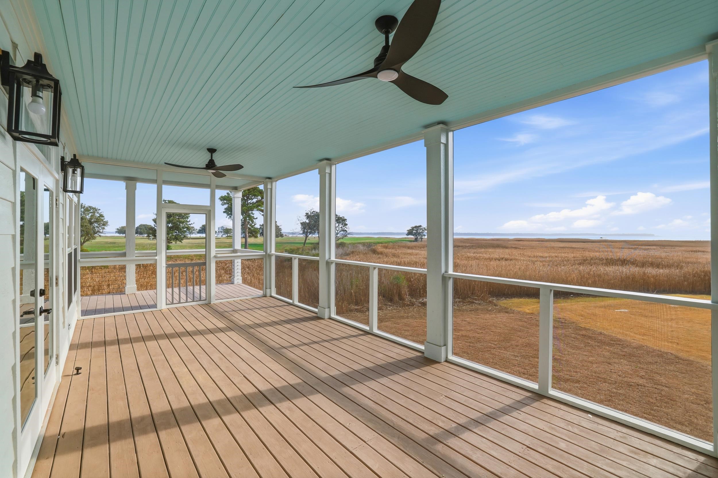 145 Oak Bay Drive Georgetown, SC 29440 - Photo 35 of 39 Screened in Porch with ceiling fans