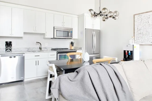 a bed room with a bed furniture and a window