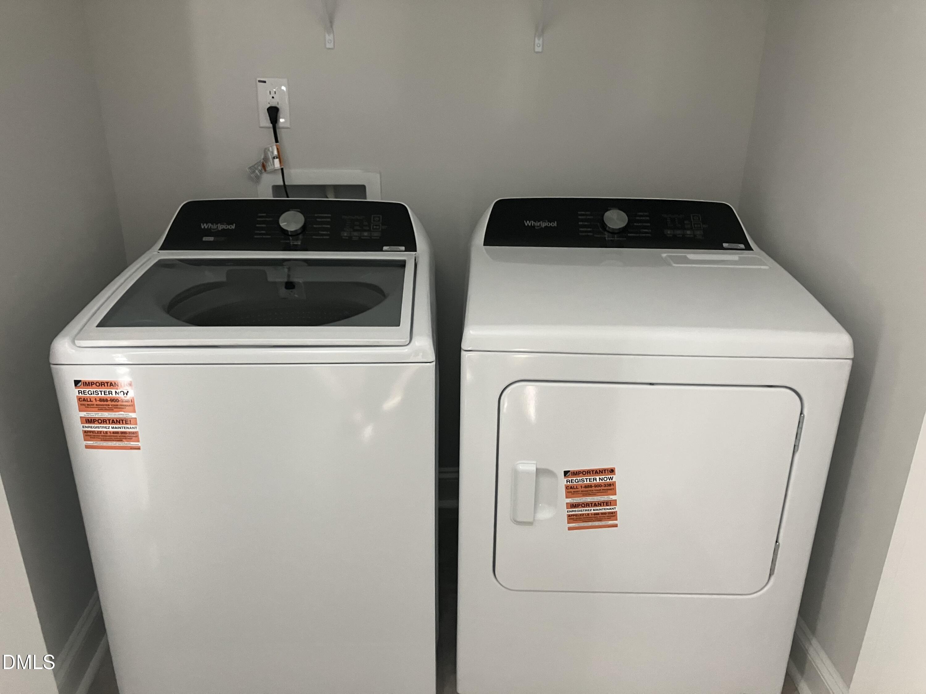2042 Fishamble Street Fuquay-Varina, NC 27526 - Photo 9 of 15 a utility room with dryer and washer