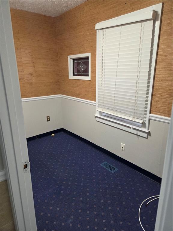 293 North Broad Street Winder, GA 30680 - Photo 8 of 10 a view of an empty room with a window