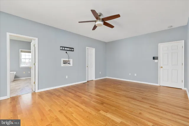 a white bath tub sitting in a bathroom
