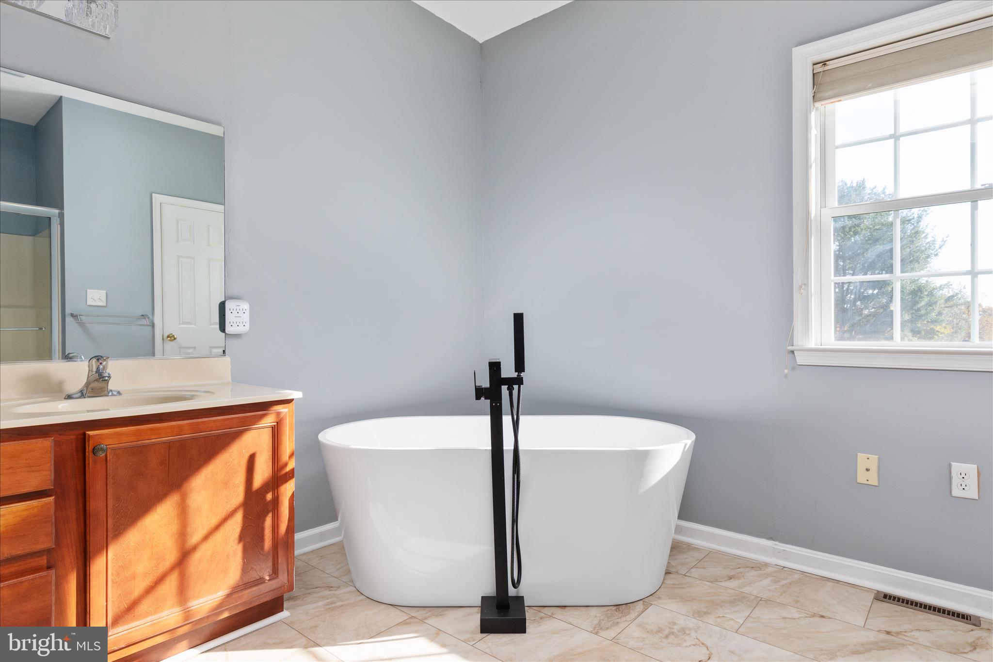 1286 Three Run Road Inwood, WV 25428 - Photo 24 of 74 a white bath tub sitting in a bathroom