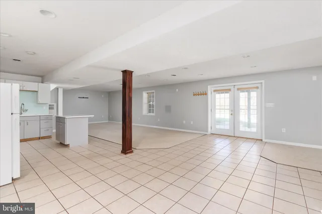 a view of an empty room and window