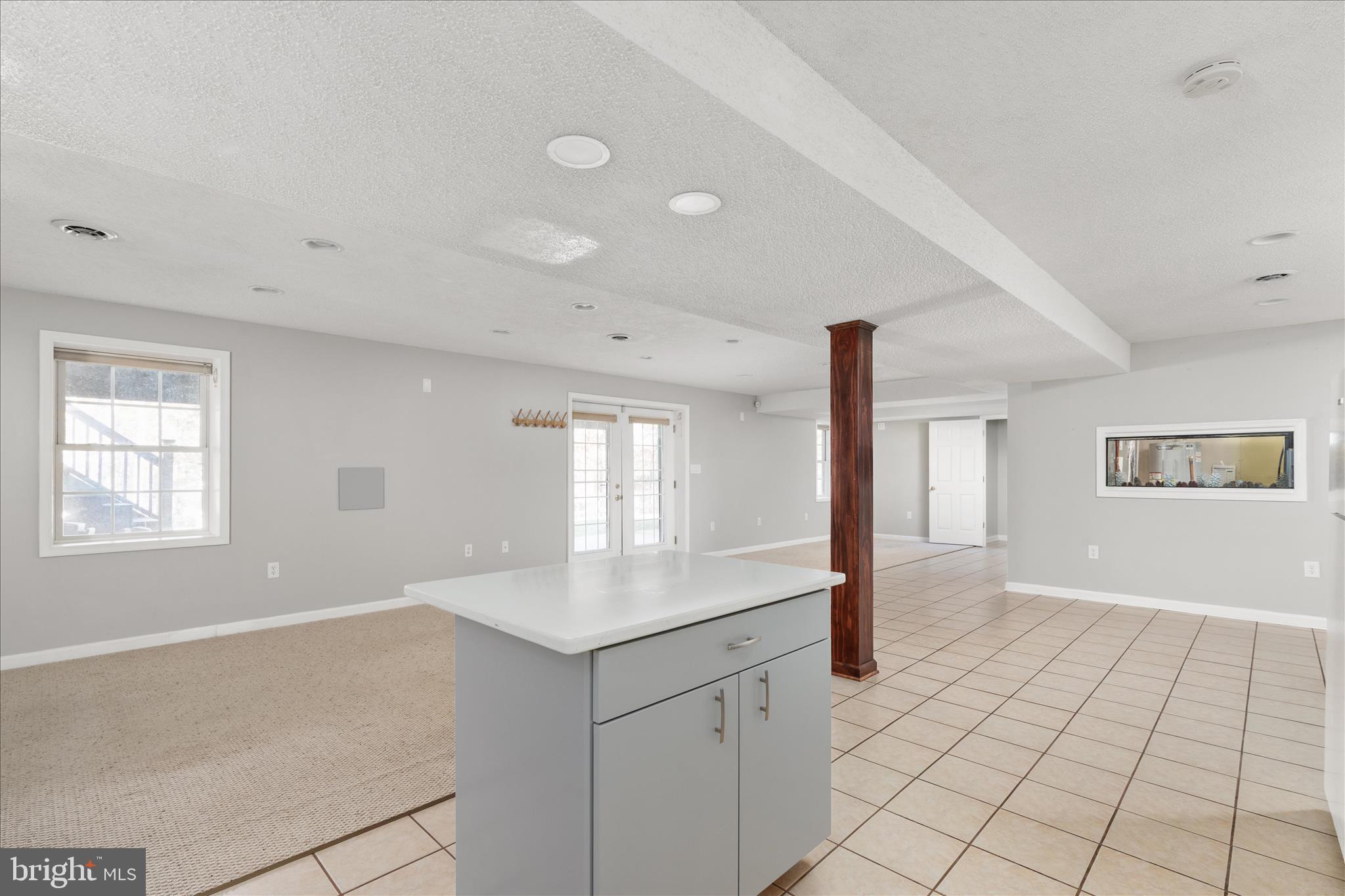 1286 Three Run Road Inwood, WV 25428 - Photo 37 of 74 a view of an empty room with window and cabinet