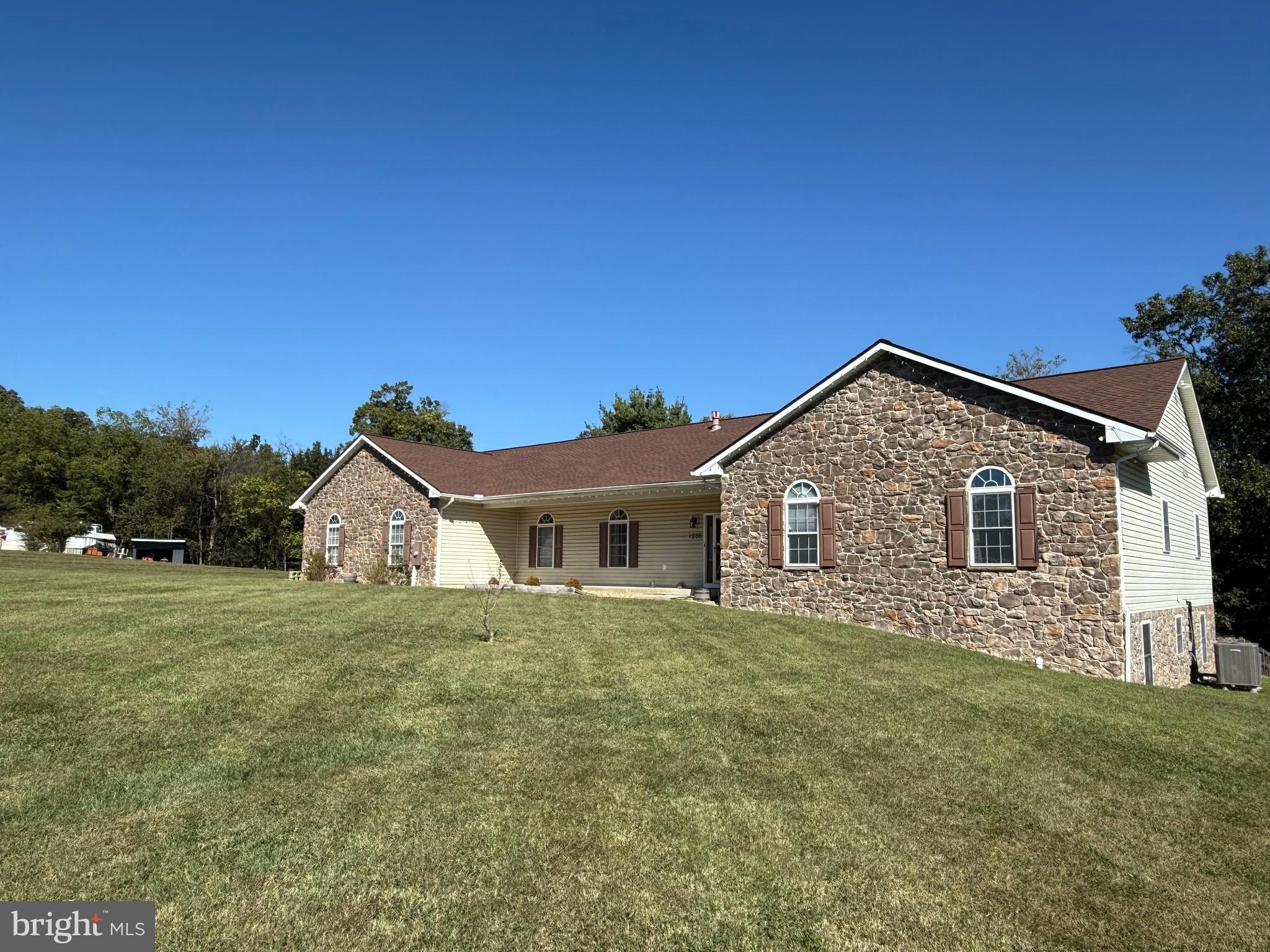 1286 Three Run Road Inwood, WV 25428 - Photo 4 of 74 a view of a house with a yard