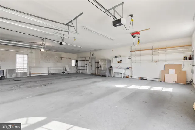 an aerial view of residential building and parking space