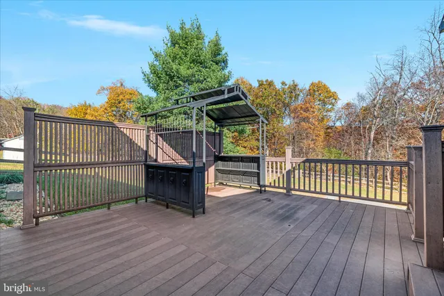 a view of house with yard and entertaining space