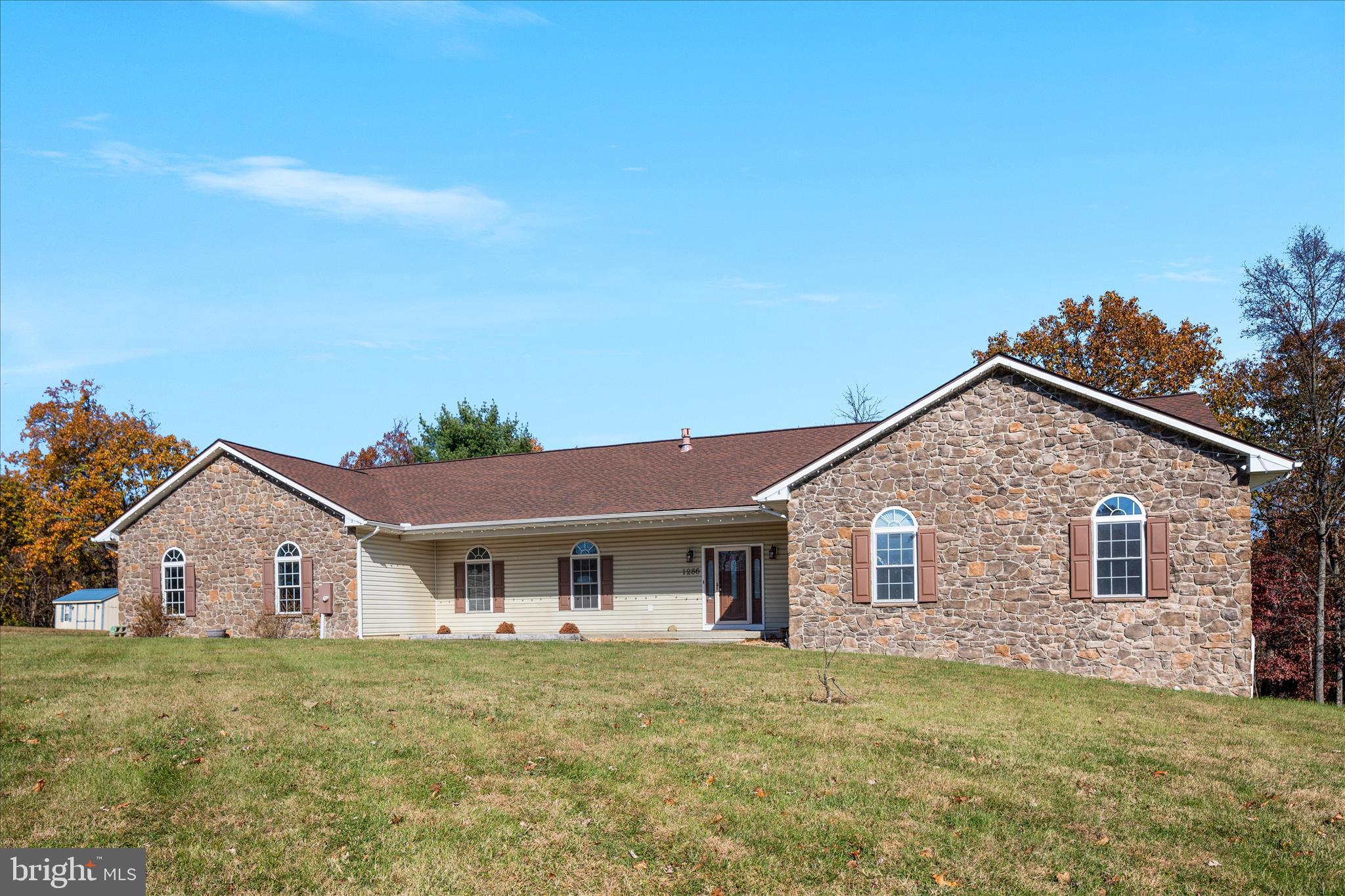 1286 Three Run Road Inwood, WV 25428 - Photo 54 of 74 a front view of a house with a garden and yard