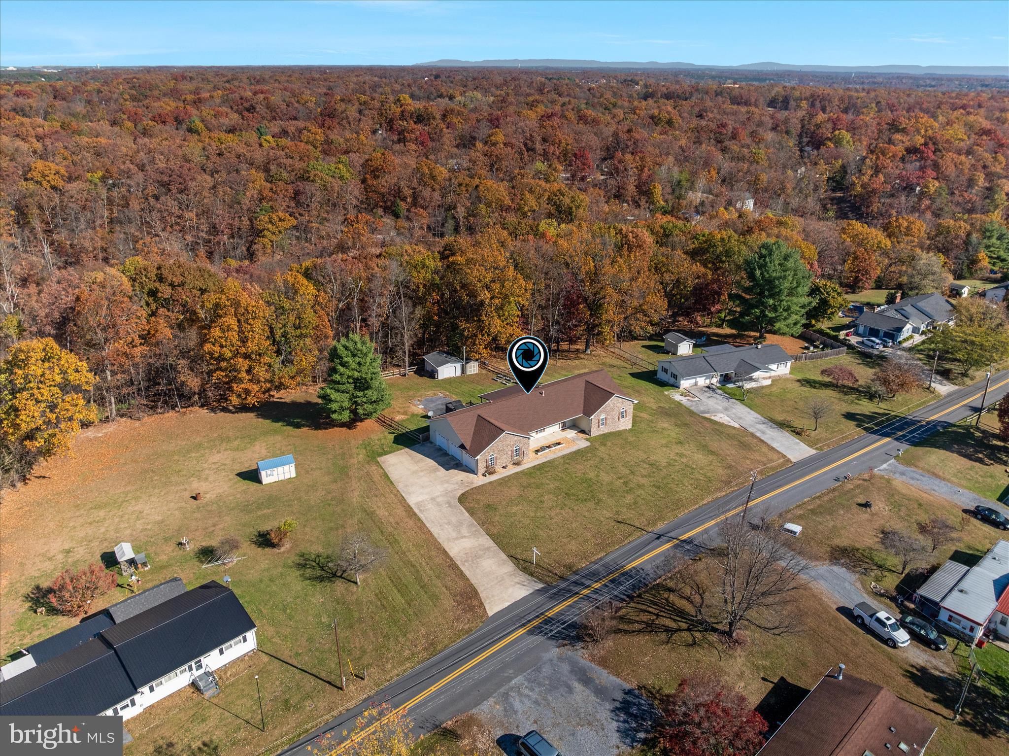 1286 Three Run Road Inwood, WV 25428 - Photo 61 of 74 an aerial view of a house with a yard