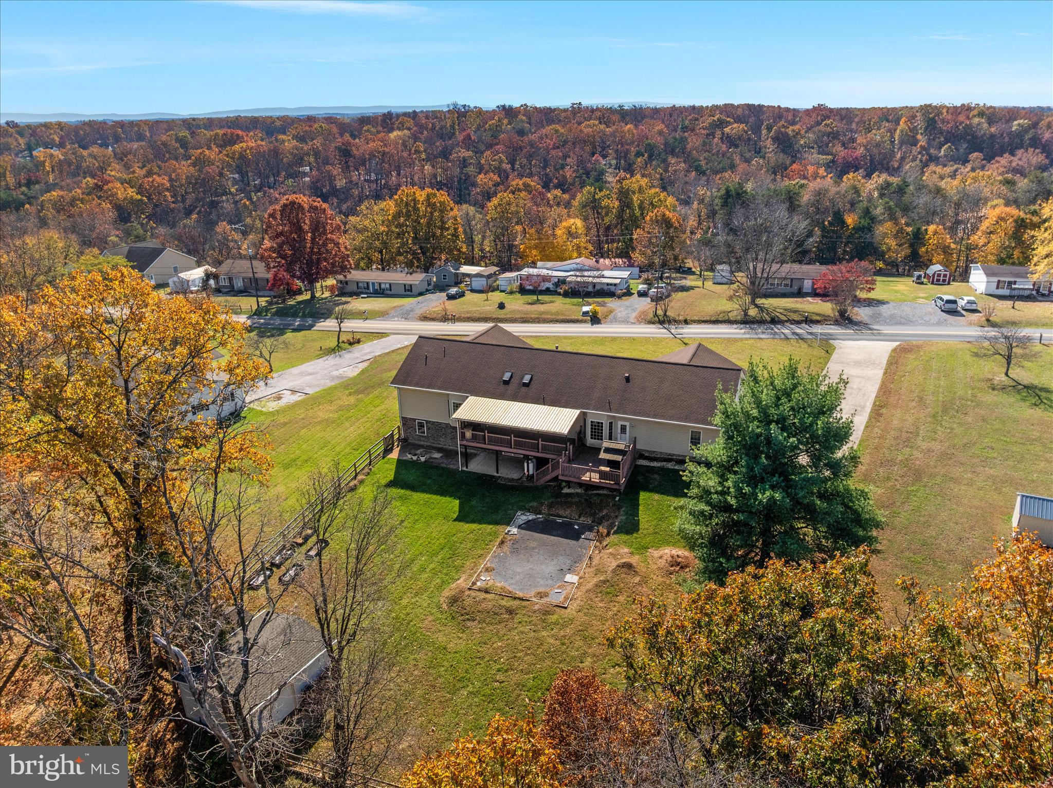 1286 Three Run Road Inwood, WV 25428 - Photo 69 of 74 an aerial view of a house with a garden and lake view