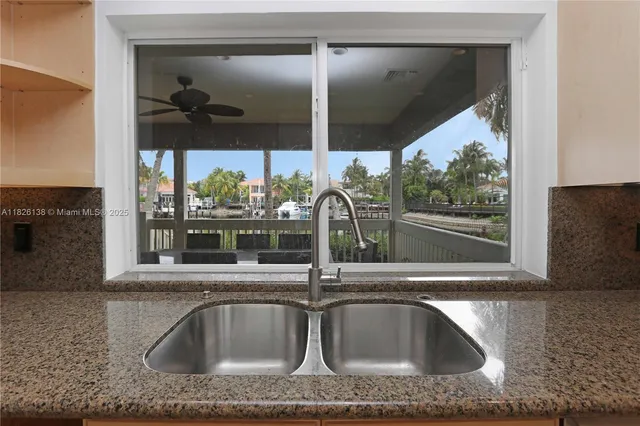 a spacious bedroom with a bed and window