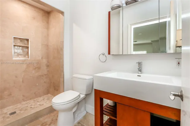 a view of a balcony with wooden floor