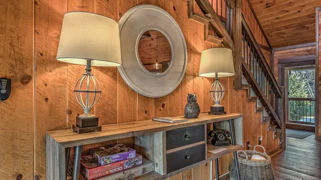 a kitchen with stainless steel appliances granite countertop a refrigerator and wooden cabinets