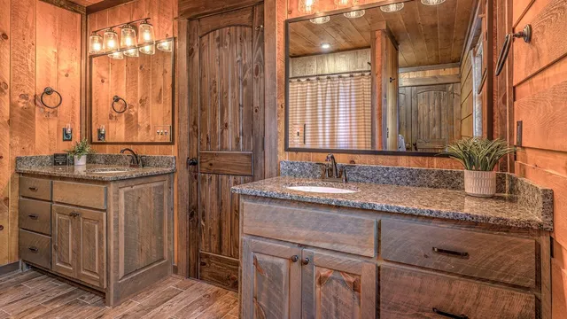 a bathroom with a sink and mirror