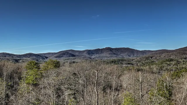 a view of a chairs and table in a patio